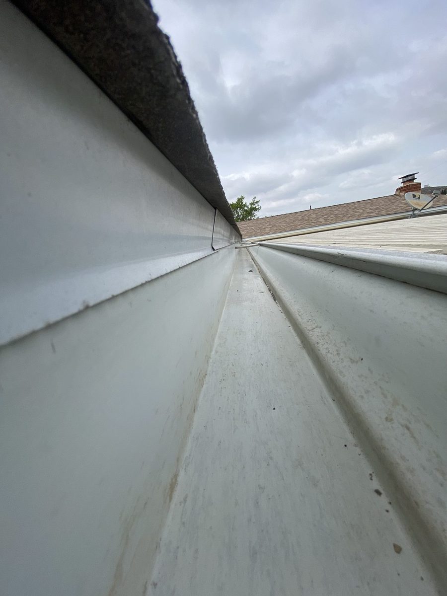 A gutter on the same home after cleaning